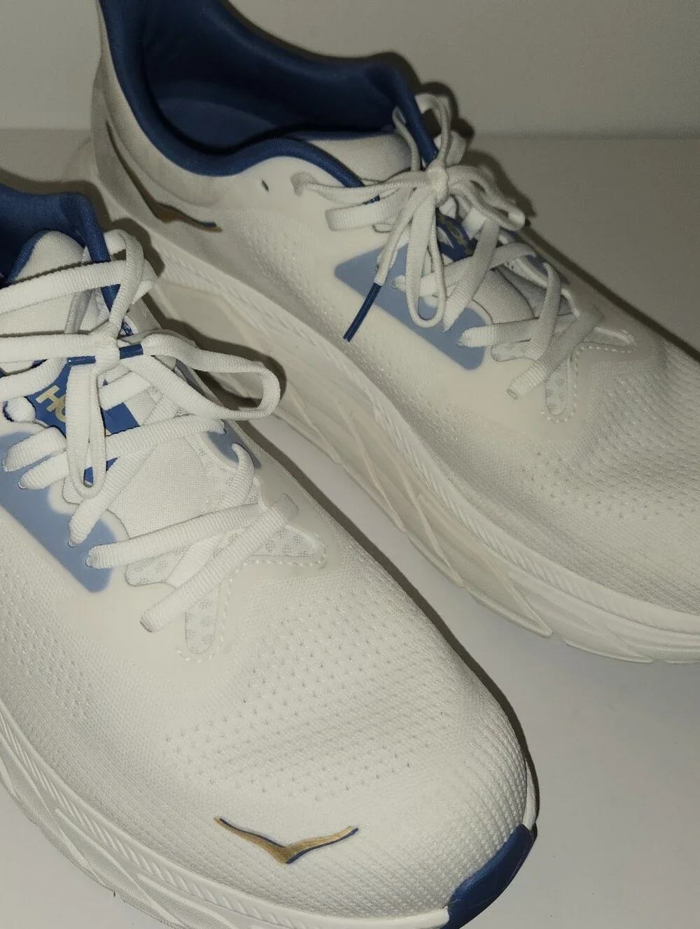 Hoka One One White and Navy Athletic Running Shoes with Gold Logo